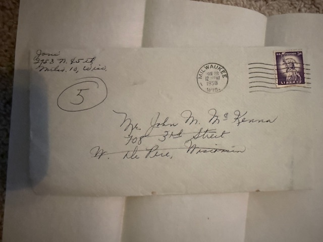 Envelope addressed to John McKenna in De Pere, Wisconsin